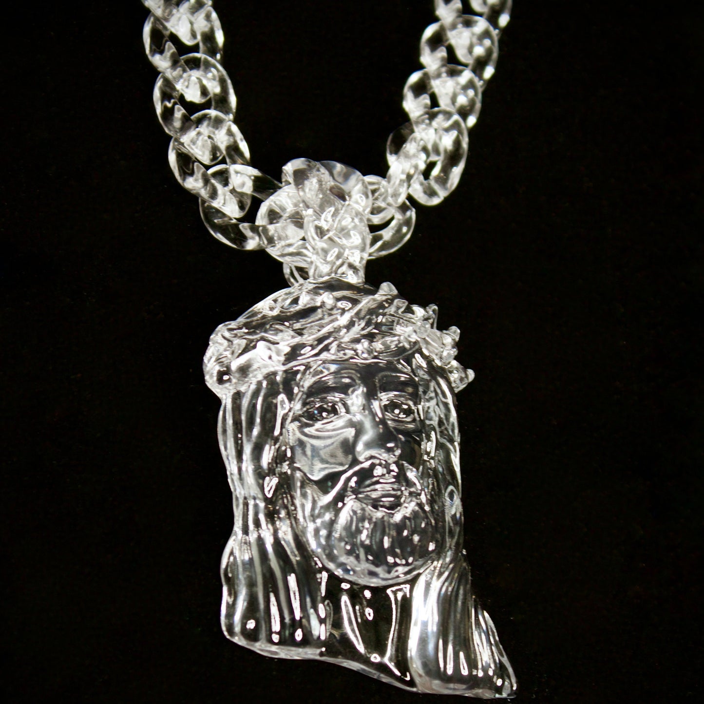 Clear Jesus Piece Pendant