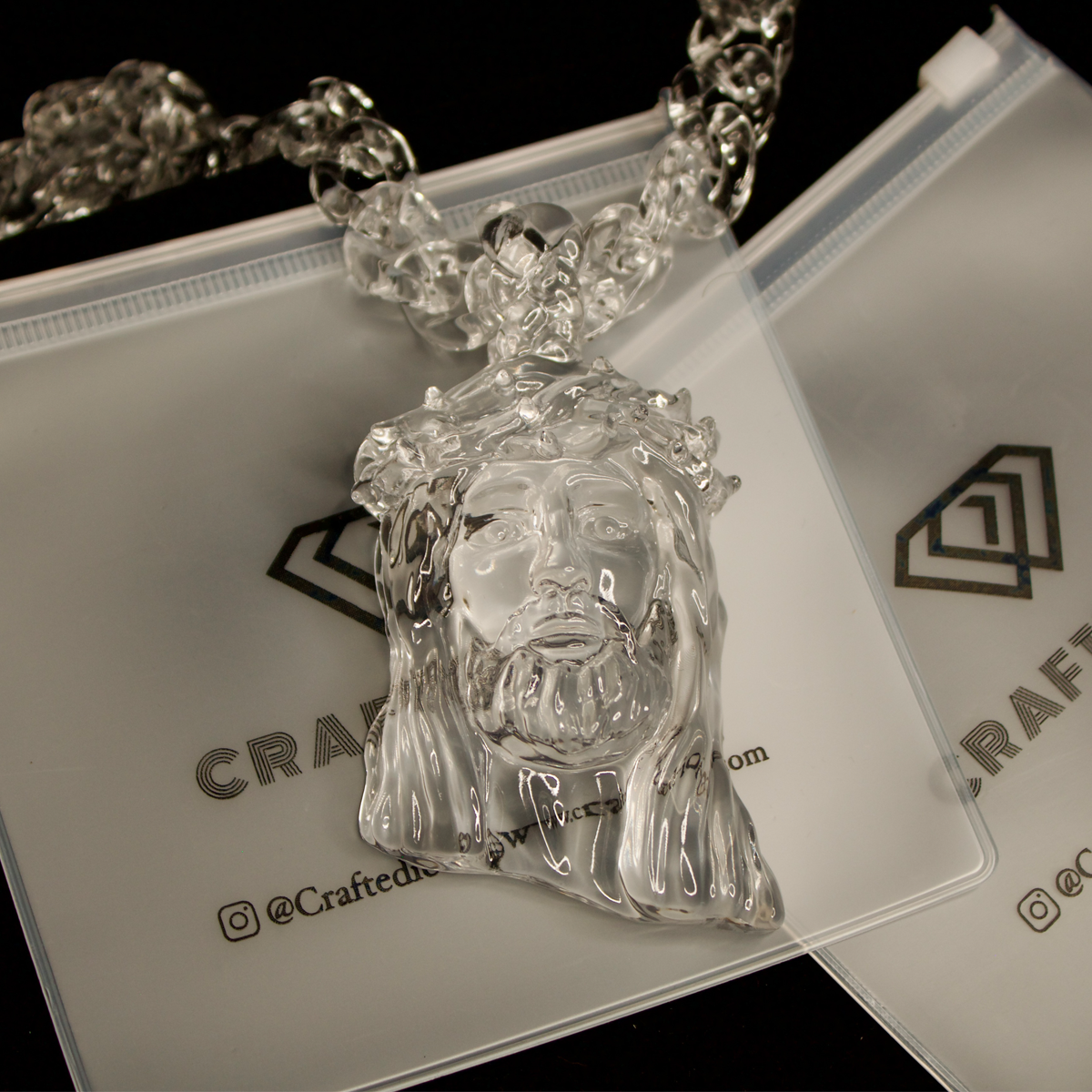 Clear Jesus Piece Pendant